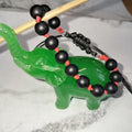 Bracelet perles noires et nœuds rouges - Ajustable artisanal
