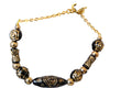 Bracelet perles noir et or élégant